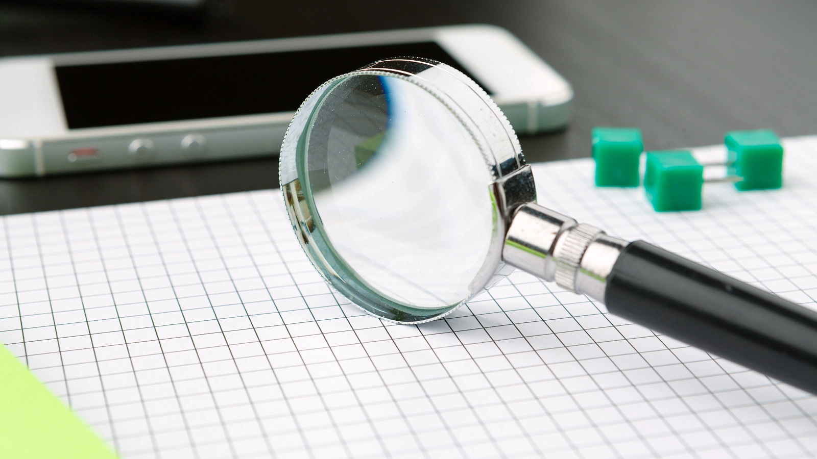 Magnifying glass checking AI answers for Legal 500 errors